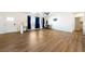 Bright living room with hard wood floors and large windows for natural light at 6101 Cavalry Trl, Pahrump, NV 89060