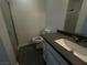 Bathroom featuring a white vanity, shower stall, and vinyl floors at 6250 W Flamingo Rd # 88, Las Vegas, NV 89103