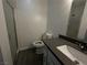 Bathroom featuring a white vanity, shower stall, and vinyl floors at 6250 W Flamingo Rd # 88, Las Vegas, NV 89103