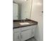Bathroom with a sleek vanity, gray countertops, and ample lighting at 6250 W Flamingo Rd # 88, Las Vegas, NV 89103