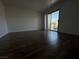 Spacious bedroom featuring a sliding glass door and plank floors at 6250 W Flamingo Rd # 88, Las Vegas, NV 89103