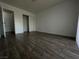 Bright bedroom featuring a closet and plank floors at 6250 W Flamingo Rd # 88, Las Vegas, NV 89103
