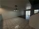 Dining room with tile flooring and stylish hanging pendant lighting fixture at 6250 W Flamingo Rd # 88, Las Vegas, NV 89103