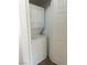 Small closet area with stacked washer and dryer units at 6250 W Flamingo Rd # 88, Las Vegas, NV 89103