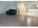 Open-concept layout with living room, stairs and eat-in kitchen, perfect for modern living and entertaining at 6250 W Flamingo Rd # 88, Las Vegas, NV 89103