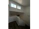 Bright, freshly painted staircase leads to upper level with natural light from modern windows at 6250 W Flamingo Rd # 88, Las Vegas, NV 89103