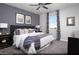 Serene main bedroom featuring a comfortable bed, stylish decor, and ample natural light for relaxation at 641 Bellus Pl # Lot 149, Henderson, NV 89015