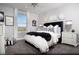 Charming secondary bedroom with stylish decor, a comfortable bed, and scenic views, creating a cozy retreat at 641 Bellus Pl # Lot 149, Henderson, NV 89015