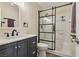 Bathroom with a vanity, a walk-in shower, and modern fixtures at 667 Del Prado Dr, Boulder City, NV 89005