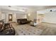 Spacious living room with hardwood flooring, a ceiling fan, and a view to the front entryway at 667 Del Prado Dr, Boulder City, NV 89005