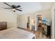Main bedroom featuring a walk-in closet, vanity area, and ensuite bathroom at 667 Del Prado Dr, Boulder City, NV 89005