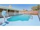Refreshing pool with a basketball hoop, perfect for enjoying sunny days at 667 Del Prado Dr, Boulder City, NV 89005