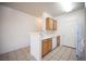 Efficient kitchen space with counter seating, and essential appliances offering a functional design at 7155 S Durango Dr # 205, Las Vegas, NV 89113