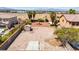 Aerial view of a house with an empty backyard with a small storage shed at 7794 River Mist Ct, Las Vegas, NV 89113