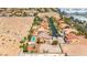 A quiet neighborhood with beautifully landscaped yards and serene swimming pools in a peaceful desert setting at 7794 River Mist Ct, Las Vegas, NV 89113