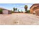 Large backyard space ready to be designed, currently with a shed and dirt at 7794 River Mist Ct, Las Vegas, NV 89113