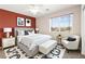 Nicely decorated bedroom with a large window providing natural light and great views at 7794 River Mist Ct, Las Vegas, NV 89113