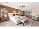 Comfortable main bedroom with lots of natural light, accent lighting, and carpet floors at 7794 River Mist Ct, Las Vegas, NV 89113