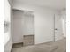 Bedroom with carpet, mirrored closet doors, and a view of the neighborhood through the window at 7814 Granite City Ct, Las Vegas, NV 89166