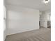 Bedroom with carpet, white walls, and natural light coming from the window at 7814 Granite City Ct, Las Vegas, NV 89166