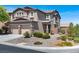 Charming two-story home featuring a two car garage and a beautifully landscaped front yard at 7814 Granite City Ct, Las Vegas, NV 89166