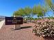 Huckleberry Park entrance sign with colorful flowers and desert landscaping in a Gathering-friendly community at 7814 Granite City Ct, Las Vegas, NV 89166