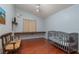Cozy Bedroom with warm wood floors, natural light, and a built-in desk at 800 Antonio Dr, Las Vegas, NV 89107