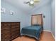 Comfortable bedroom with wood floors, a spacious dresser, and bright natural light at 800 Antonio Dr, Las Vegas, NV 89107