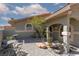 Enclosed courtyard with seating, decorative landscaping, and a charming outdoor space at 800 Antonio Dr, Las Vegas, NV 89107