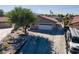 Charming single-story home with a well-manicured desert landscape and a spacious driveway at 800 Antonio Dr, Las Vegas, NV 89107