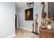 Bright foyer with tiled flooring, decorative art and giraffe statues, and front door access at 800 Antonio Dr, Las Vegas, NV 89107