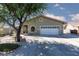 Charming single-story home with a well-maintained front yard and attached two-car garage at 800 Antonio Dr, Las Vegas, NV 89107