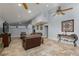 Spacious living room with high ceilings, tiled flooring, and comfortable seating area at 800 Antonio Dr, Las Vegas, NV 89107