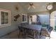 Charming covered patio with a dining table and decorative accents at 800 Antonio Dr, Las Vegas, NV 89107
