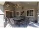 Charming covered patio with a dining table and decorative accents at 800 Antonio Dr, Las Vegas, NV 89107