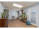 Sun room with lots of plants and lots of natural light from the skylight and windows at 800 Antonio Dr, Las Vegas, NV 89107