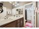 Bathroom featuring double sinks with a shower/tub combo at 8032 Audubon Canyon St, Las Vegas, NV 89131