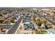 A residential area with similar houses, streets and a desert landscape at 813 Cherry Dr, Henderson, NV 89002