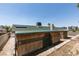 Backyard extension to a home with decorative elements and green roofing at 813 Cherry Dr, Henderson, NV 89002