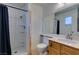 Bathroom with walk-in shower, vanity, and toilet at 813 Cherry Dr, Henderson, NV 89002
