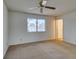 Bedroom featuring overhead fan, and a glimpse of a nearby yard at 813 Cherry Dr, Henderson, NV 89002