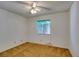 A clean bedroom with overhead fan, with light coming in through a window at 813 Cherry Dr, Henderson, NV 89002