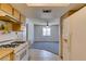 An inside look at the kitchen that opens into the living room area of the home at 813 Cherry Dr, Henderson, NV 89002