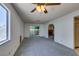 Open living room with sliding door, and fireplace with an easy transition to kitchen at 813 Cherry Dr, Henderson, NV 89002