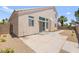 Low-maintenance backyard featuring a concrete patio, minimal landscaping, and enclosed by a block wall at 9011 Aldershot Ct, Las Vegas, NV 89147