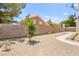Large backyard featuring xeriscaping, a block wall, and privacy from neighboring houses at 9011 Aldershot Ct, Las Vegas, NV 89147