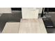 Upgraded design materials include carpet, LVP flooring, and counter top samples with a sleek black kitchen faucet at 9113 Rivington Ave, Las Vegas, NV 89148