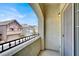 Balcony with views of the neighborhood and the architecture of neighboring homes at 9225 Dalmahoy Pl, Las Vegas, NV 89145
