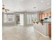 Bright kitchen features tile floors, a breakfast bar, and lots of natural light at 9225 Dalmahoy Pl, Las Vegas, NV 89145