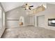 Spacious living room with high ceilings, a fireplace, and access to an open bathroom at 9225 Dalmahoy Pl, Las Vegas, NV 89145